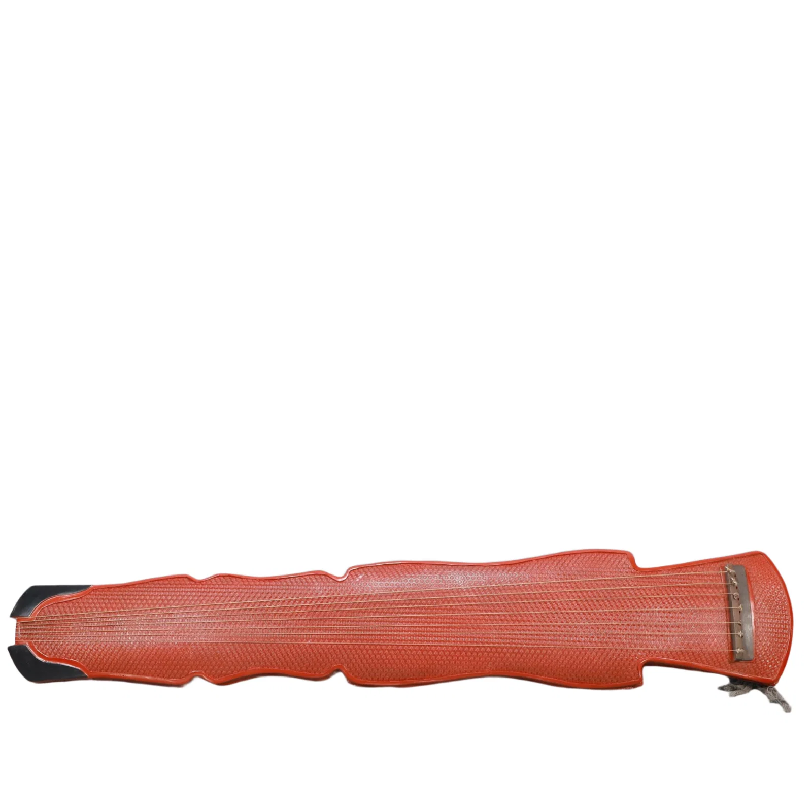 An Exquisite Carved Red Lacquer 'qin' Ornament