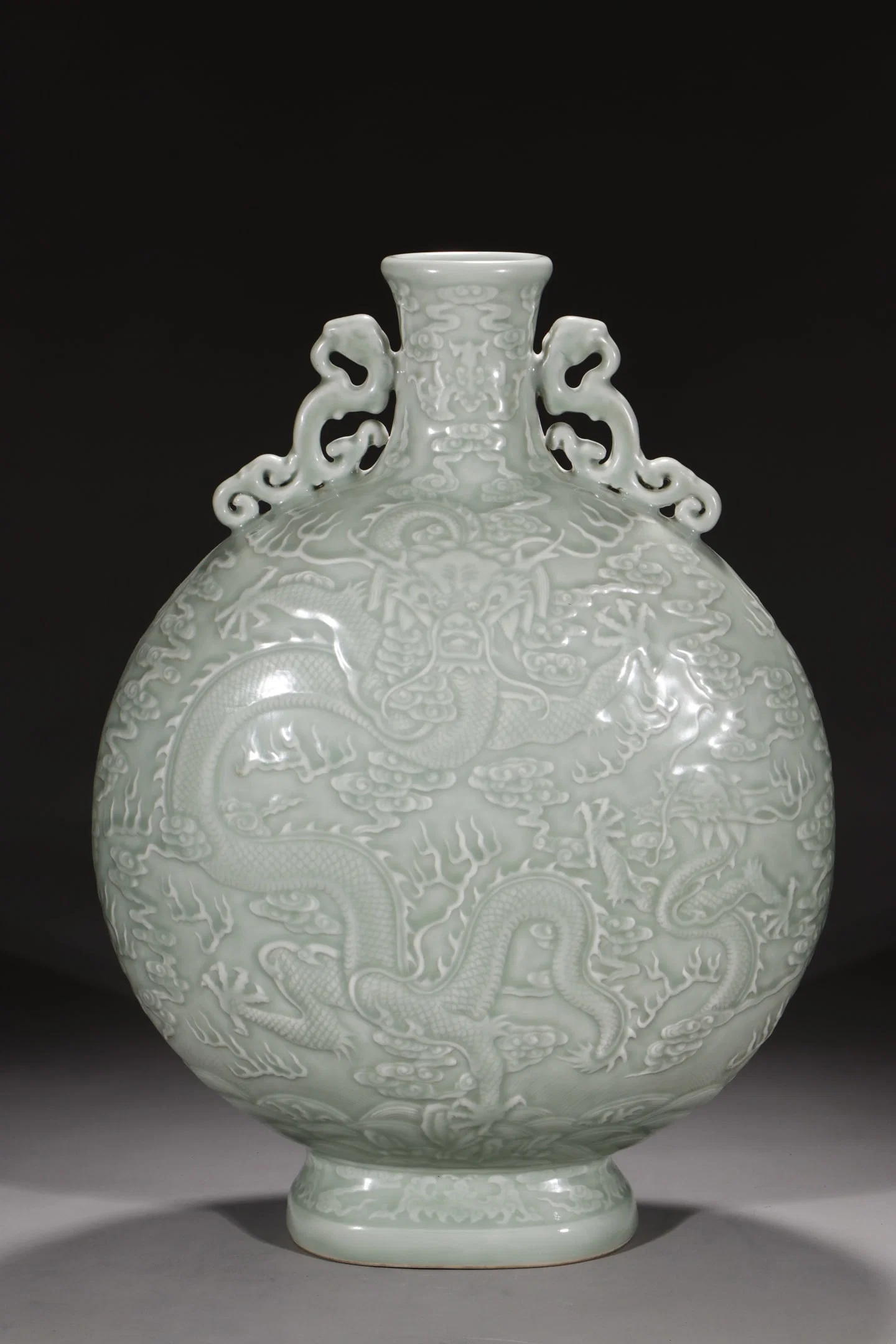An Exquisite Celadon Glazed Auspicious Cloud and Dragon Pattern Double-Ears Vase