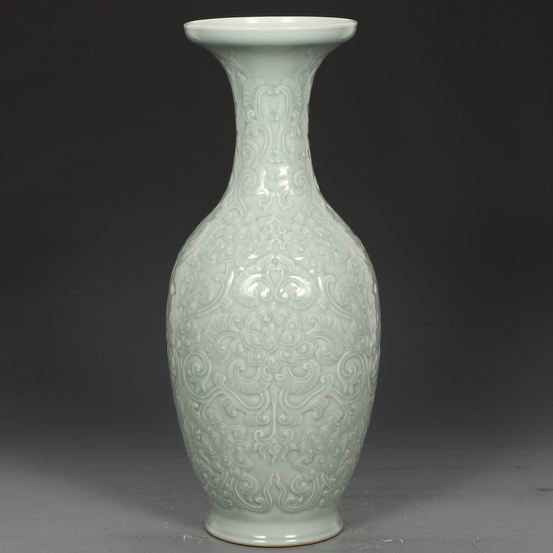An Exquisite Celadon Glazed Lotus Pattern Vase
