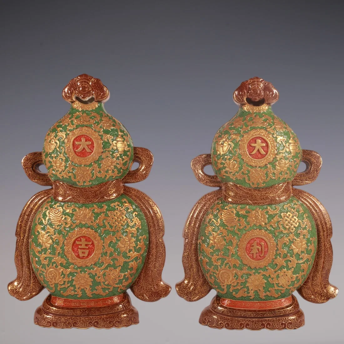 An Exquisite Enamel Green Ground Painted Gold Eight Treasures Pattern Gourd-Shaped Vase