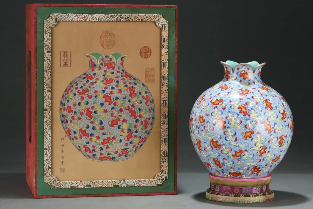 An Exquisite Famille-Rose Painted Gold Auspicious Cloud and Bats Pattern Vase