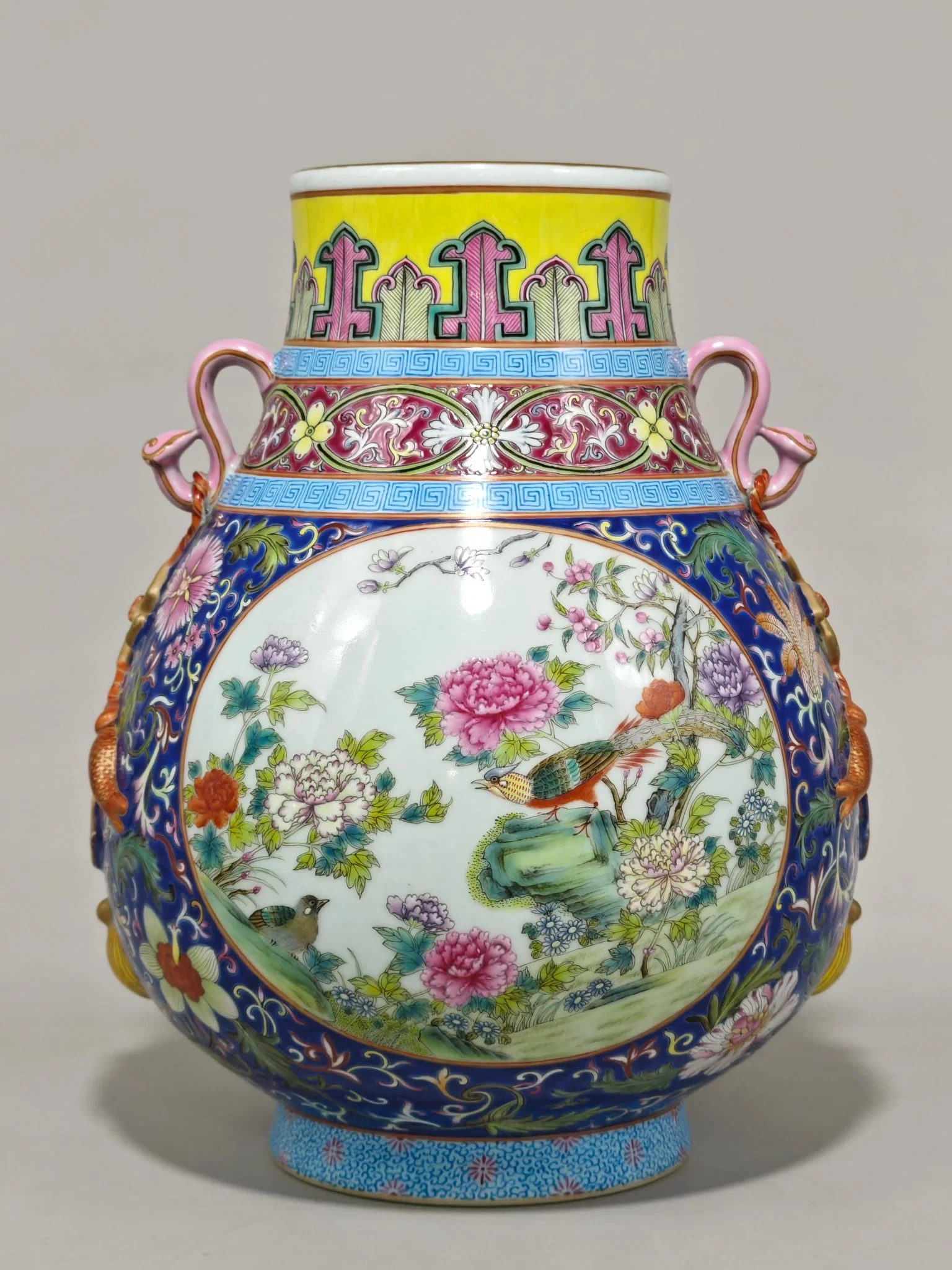 An Exquisite Famille-Rose Sapphire Blue Glazed Flower and Bird Pattern Double-Ears Jar