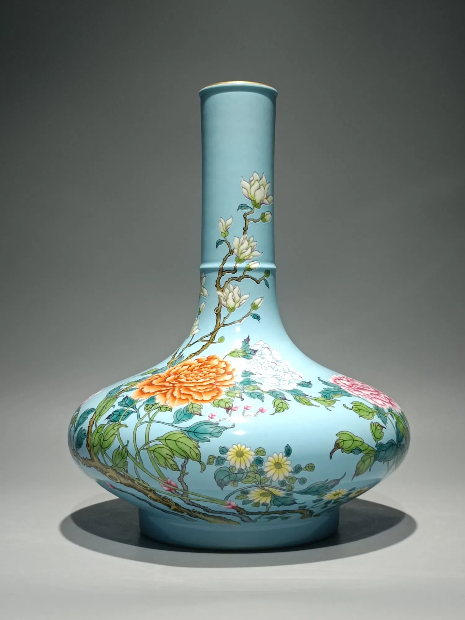 An Exquisite Famille-Rose Turquoise Glazed Flower and Butterfly Pattern Vase