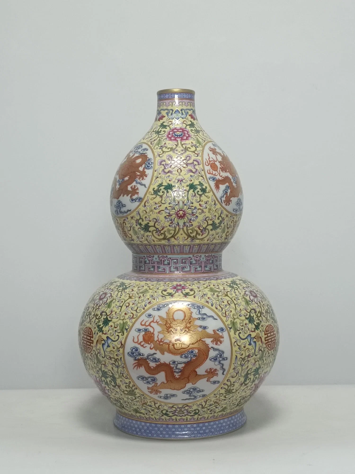 An Exquisite Famille-Rose Yellow Ground Auspicious Cloud and Dragon Pattern Gourd-Shaped Vase