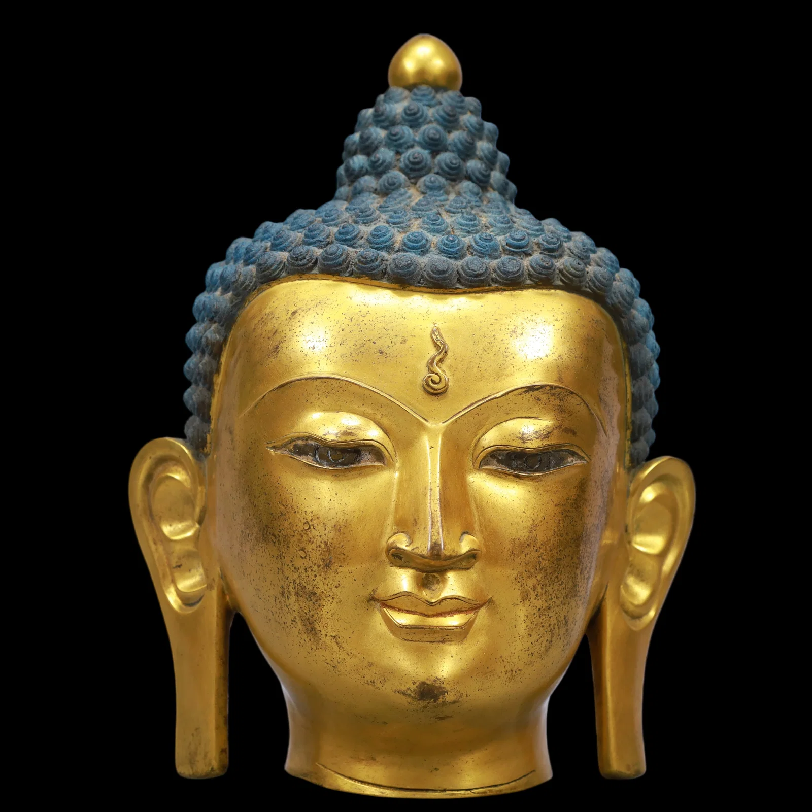 An Exquisite Gilt Bronze Buddha head