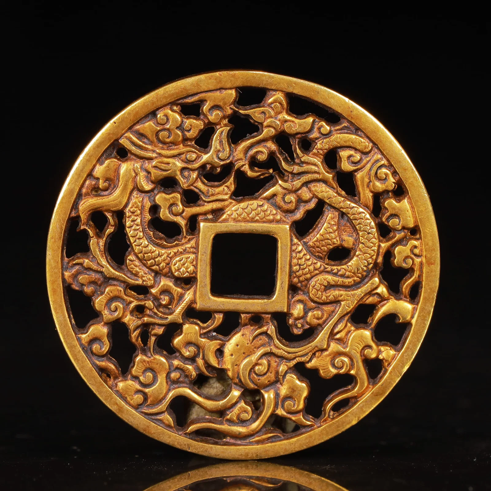 An Exquisite Gilt Bronze Dragon Pattern Coin