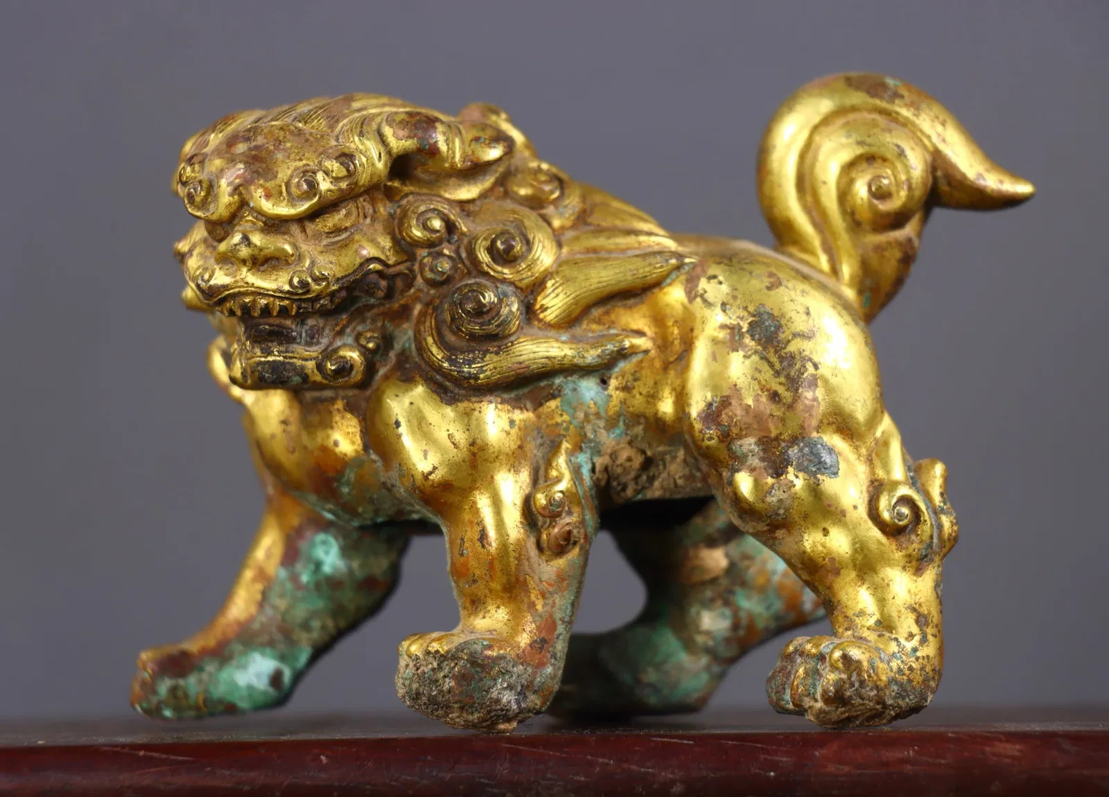 An Exquisite Gilt Bronze Lion