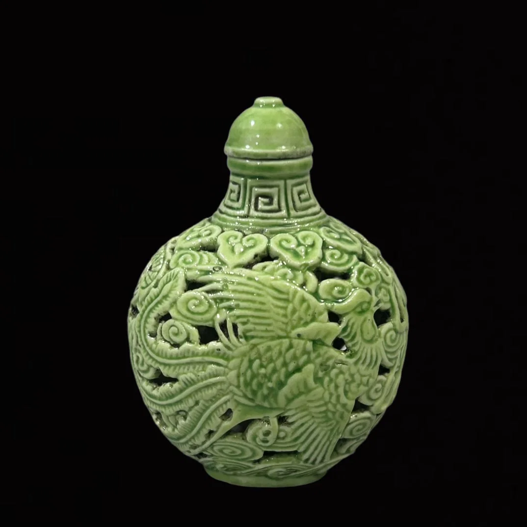 An Exquisite Green Glazed Dragon and Phoenix Pattern Snuff Bottle