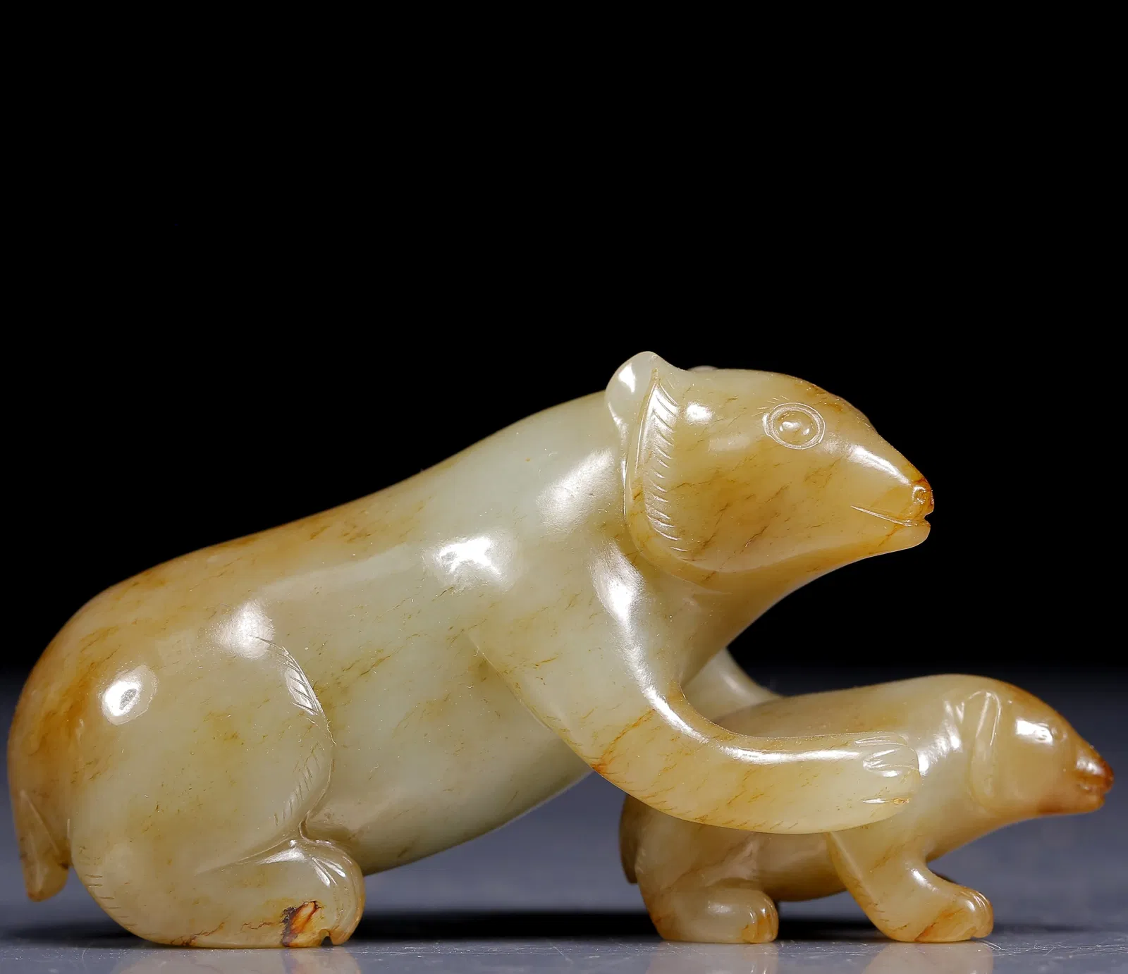 An Exquisite Greenish Jade Bear Ornament