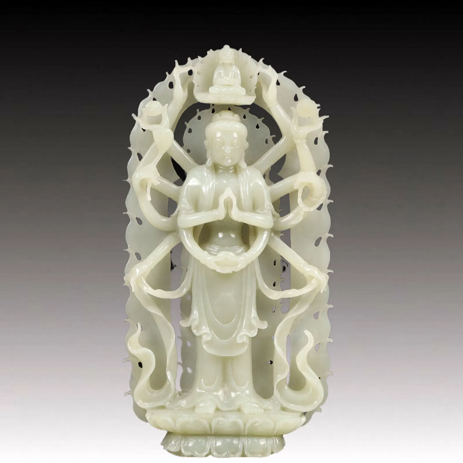 An Exquisite Greenish Jade Statue of Eight-Armed Guanyin
