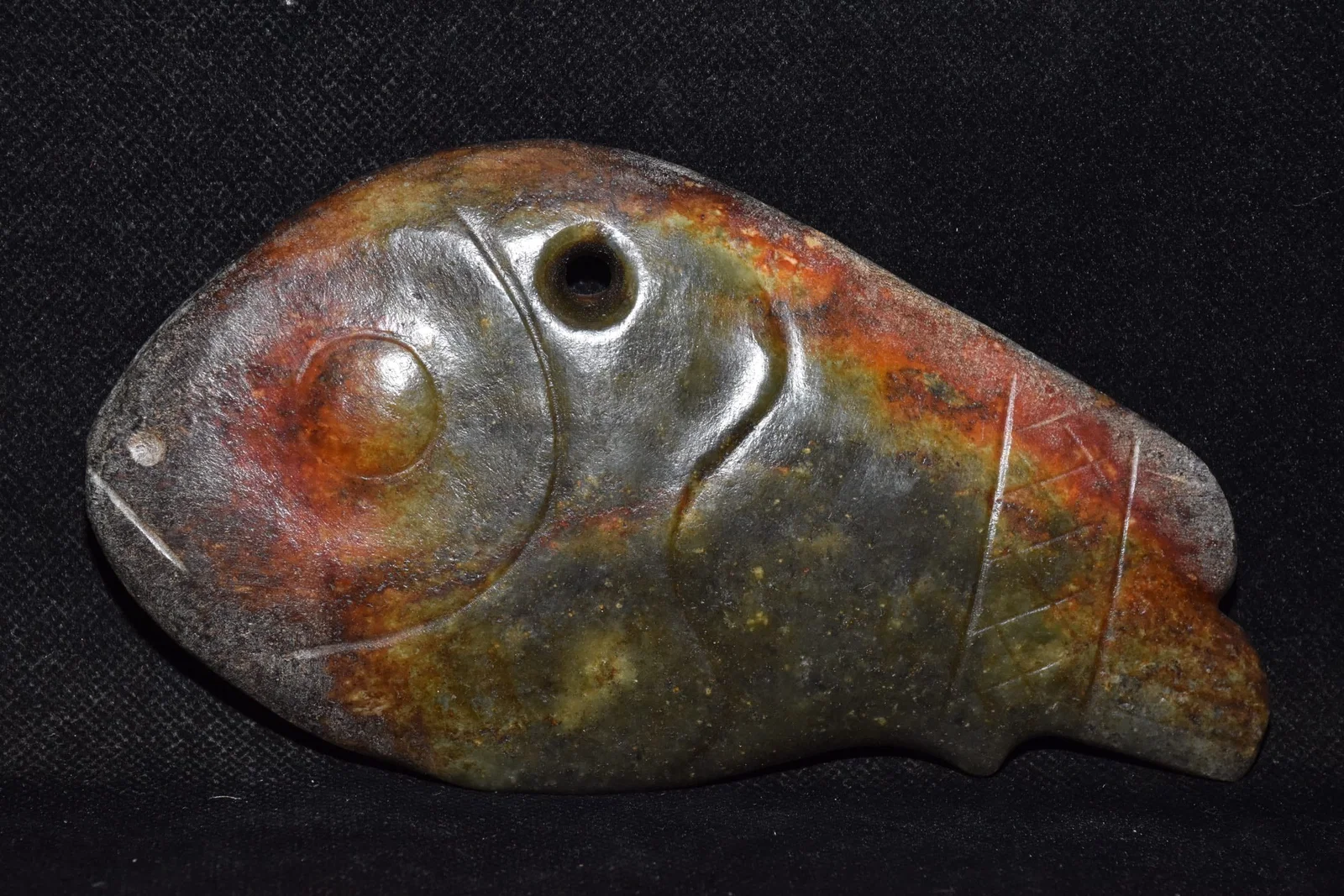 An Exquisite Hemo Jade Fish Ornament
