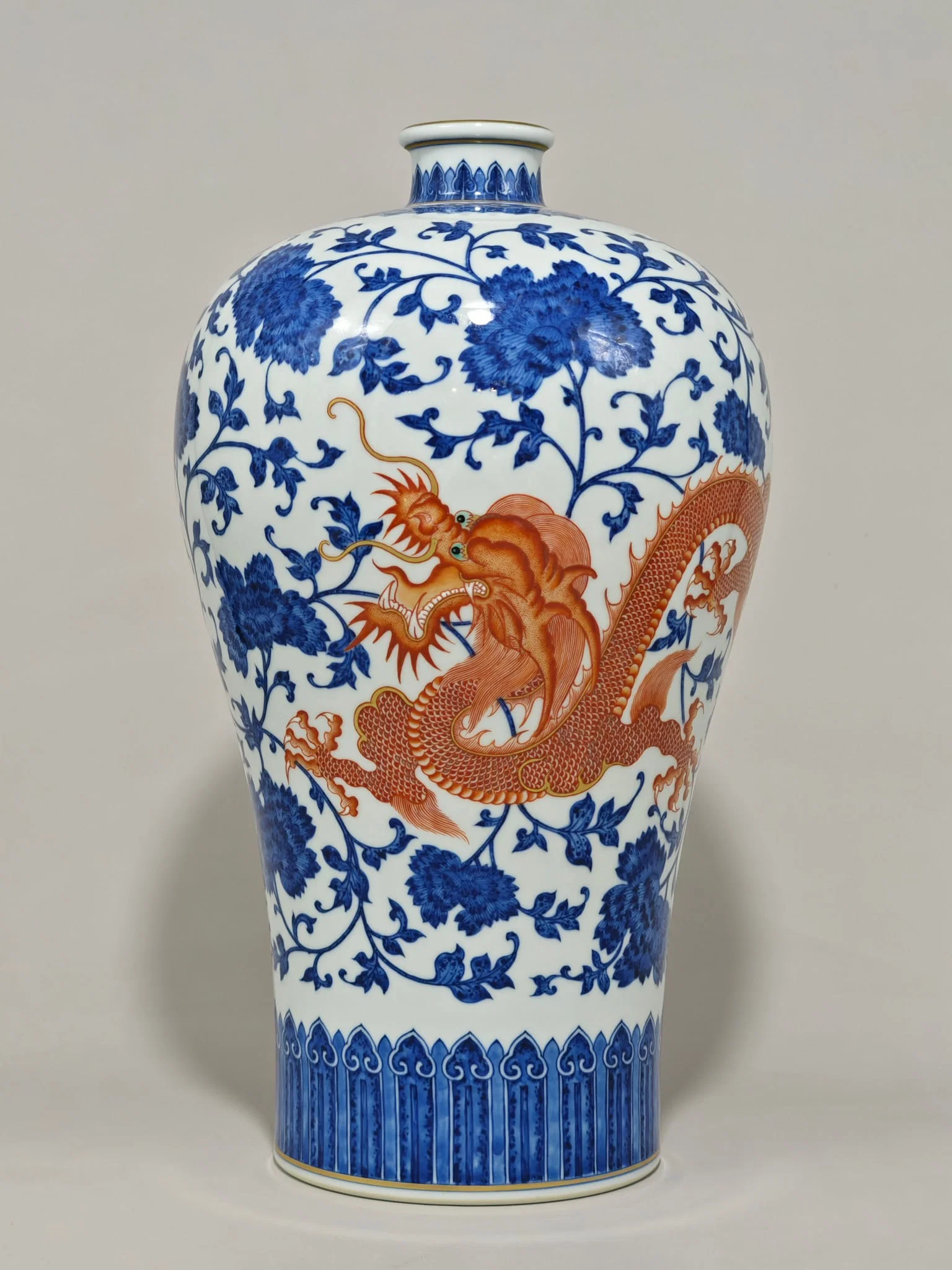 An Exquisite Iron-Red Blue and White Dragon and Phoenix Pattern Lotus Pattern Vase