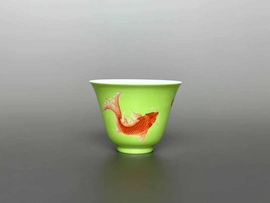 An Exquisite Iron-Red Green Ground Fish Pattern Cup