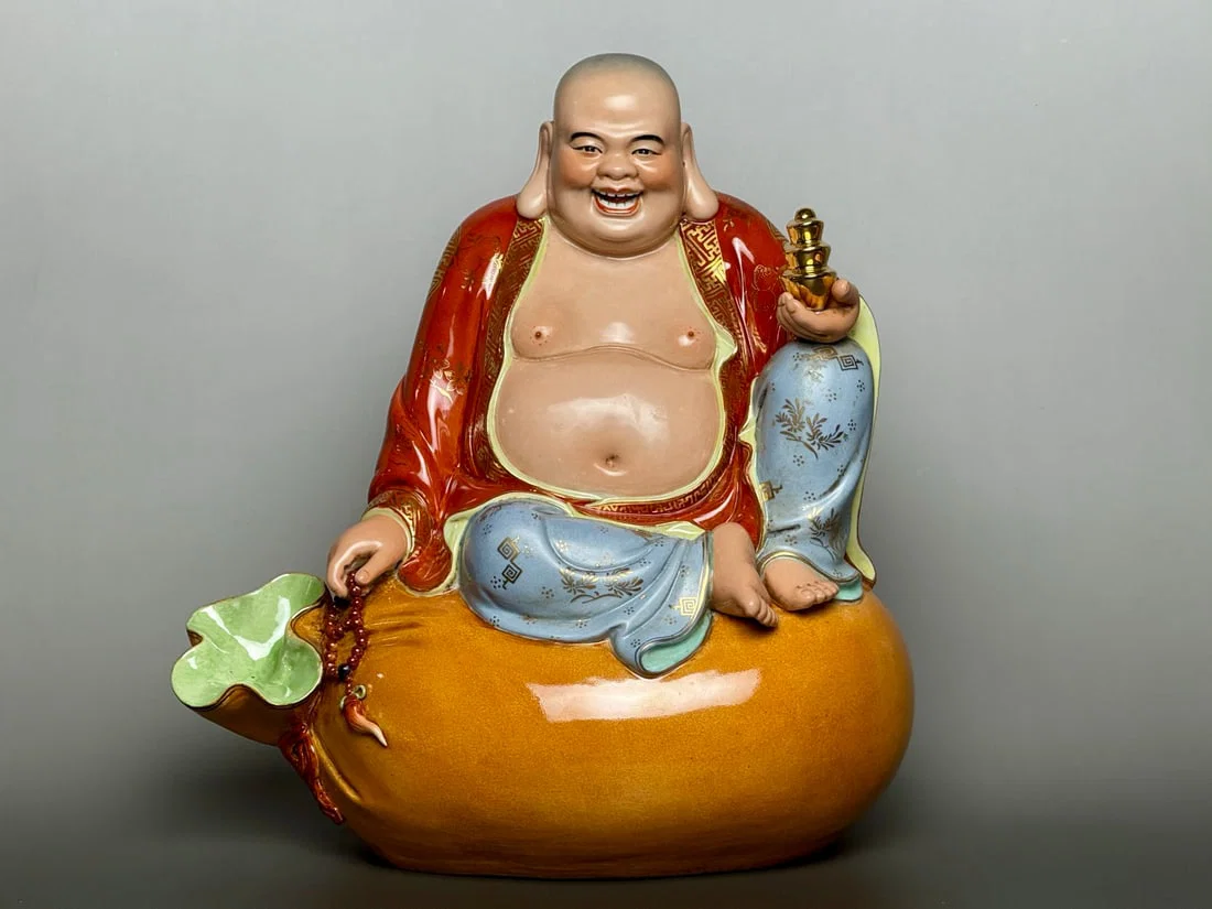 An Exquisite Iron-Red Painted Gold Statue of Arhat