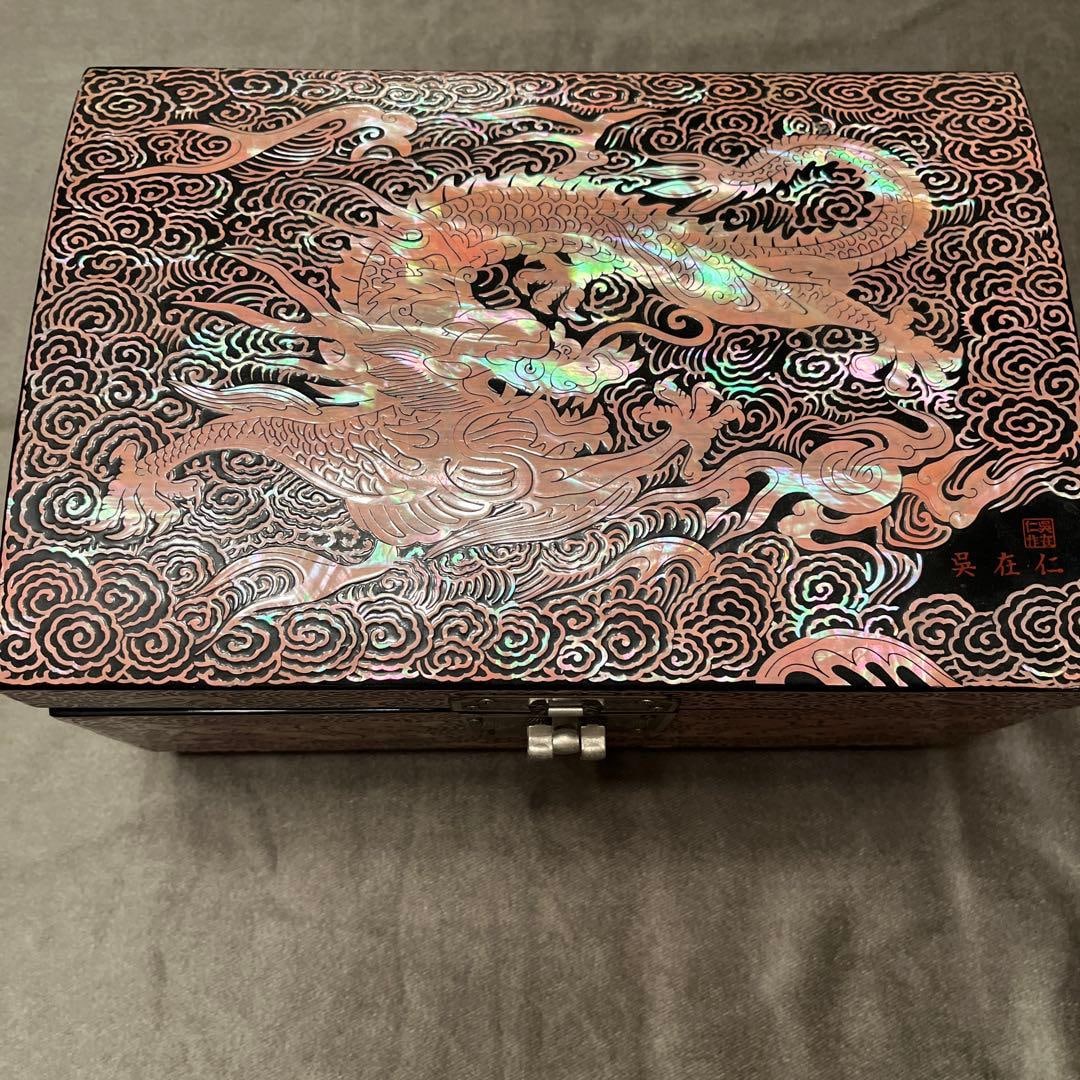 An exquisite lacquer box with dragon motifs.