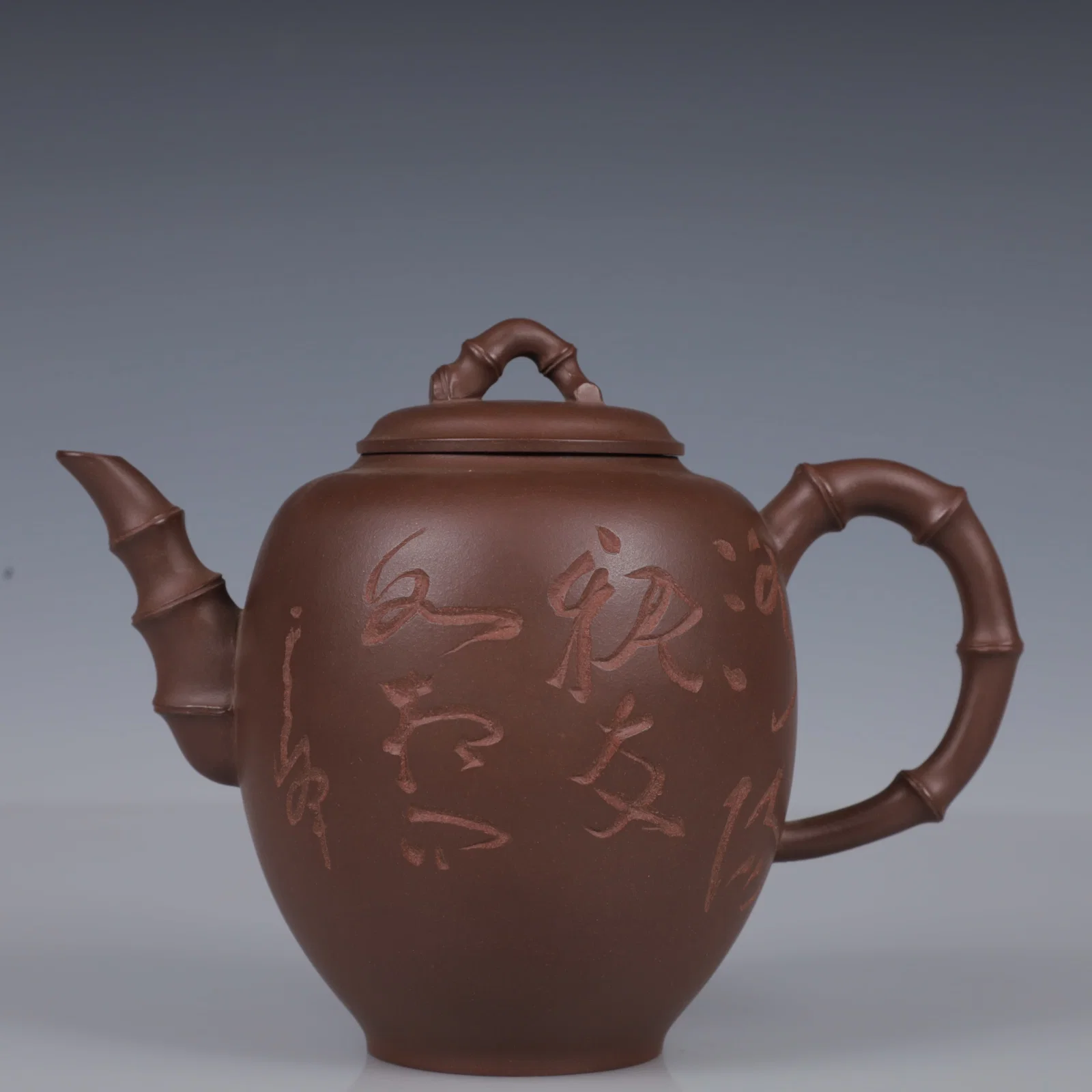 An Exquisite Purple Sands Flower and Bird Pattern Teapot