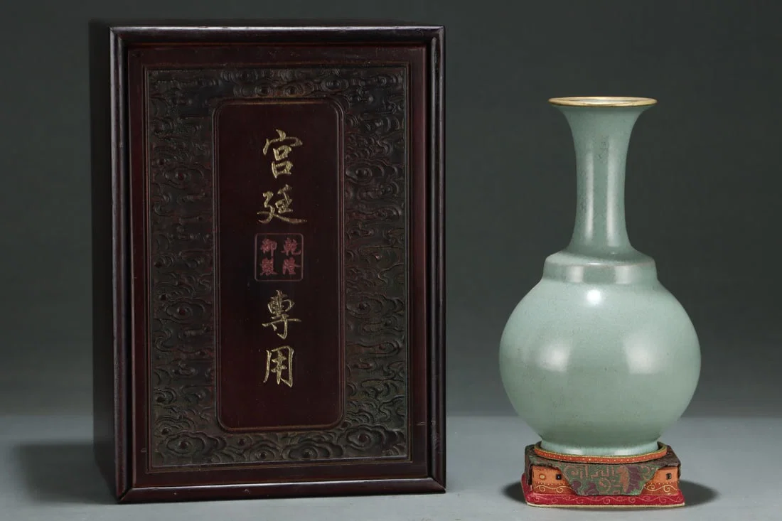 An Exquisite Ru yao Celadon Glazed Cover with Gold Vase