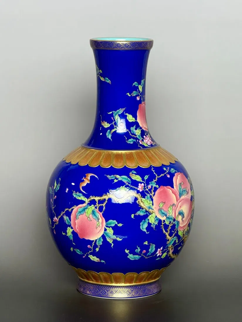 An Exquisite Sapphire Blue Glazed Famille-Rose Painted Gold Bats and Peach Pattern Vase