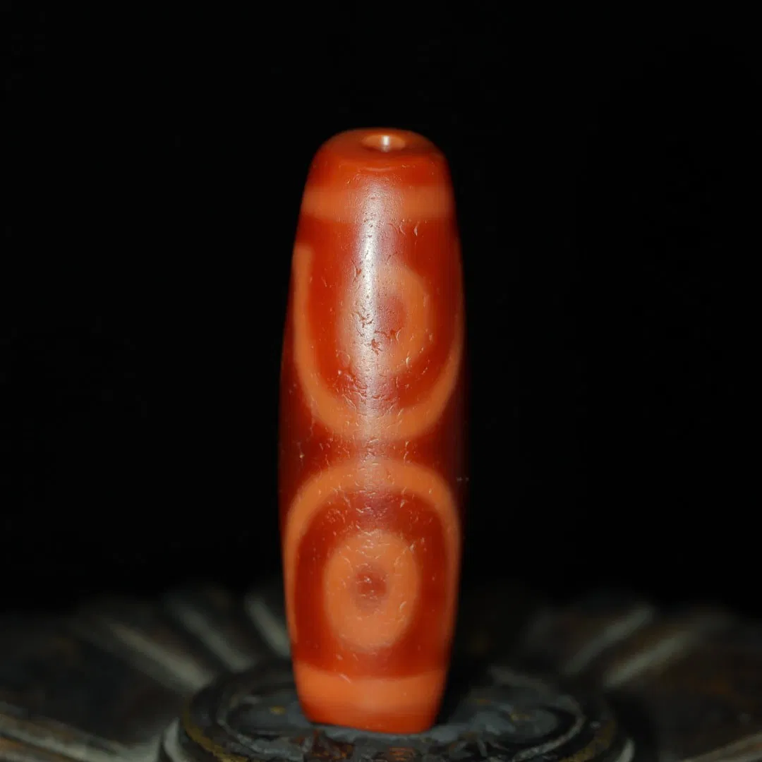 An Exquisite Seven Eyes Dzi Bead Pendant