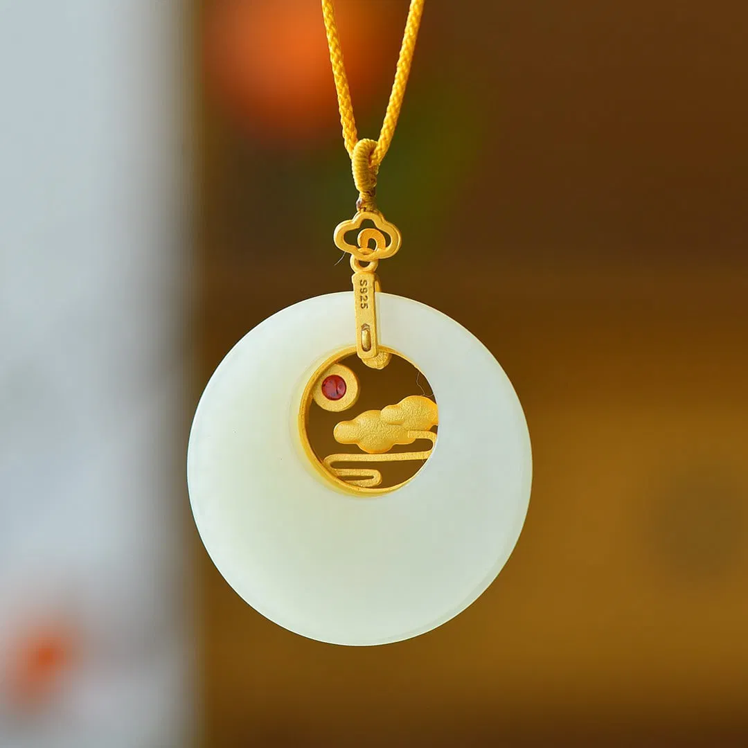 An Exquisite Sterling Silver-Gold Plated Inlaid White Jade Pendant