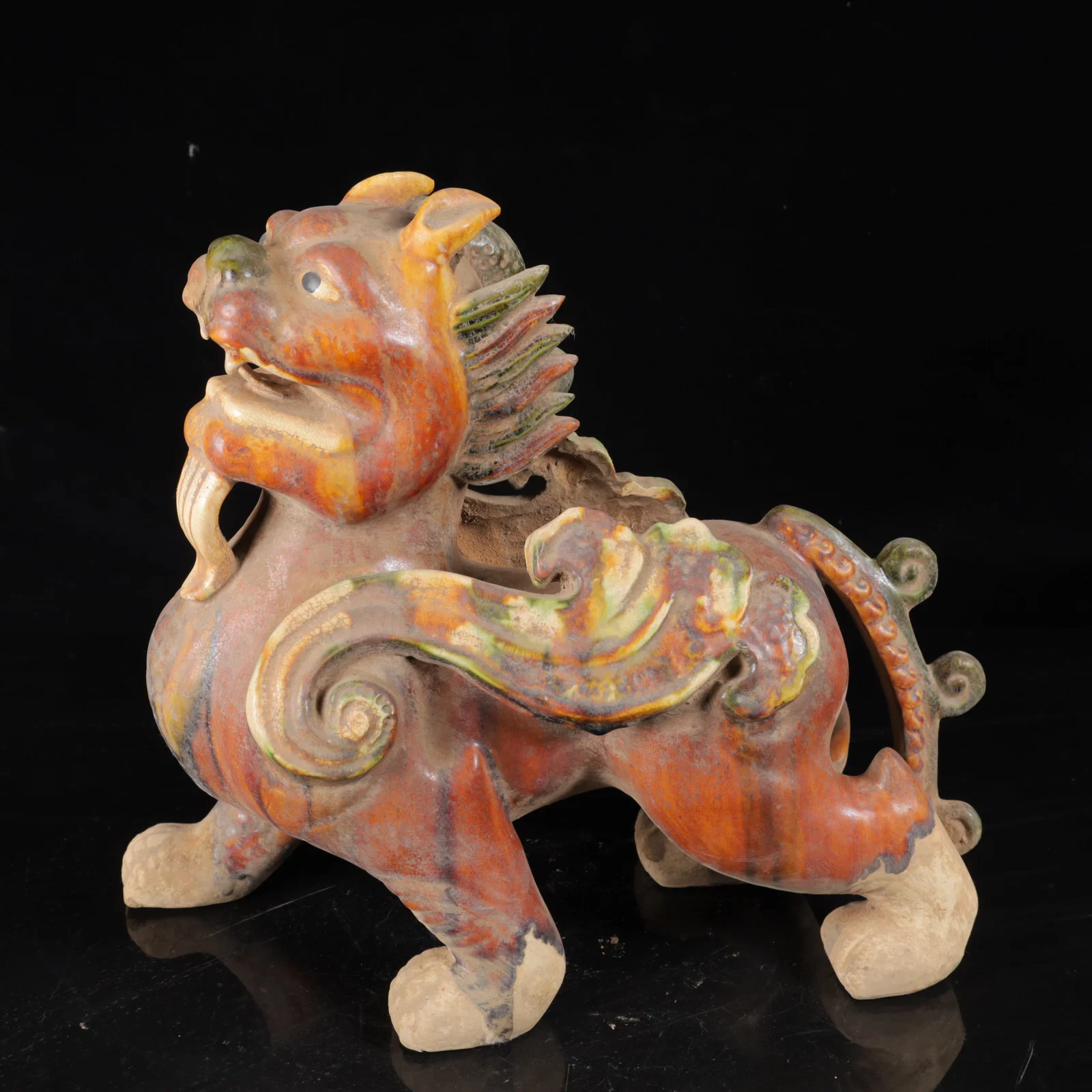 An Exquisite Tang Tri-Color Glazed Pottery Lion Ornament
