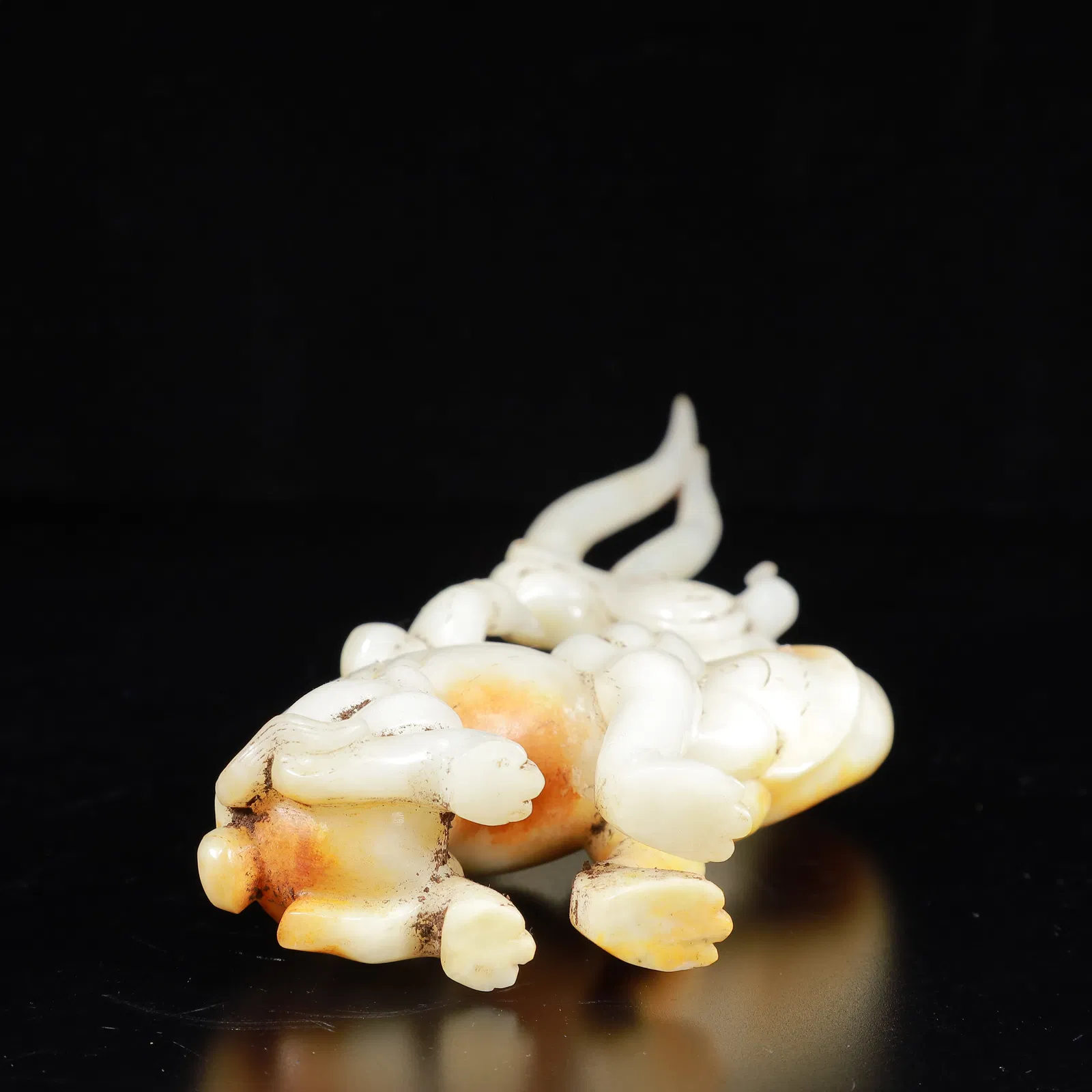 An Exquisite White Jade Auspicious Beast Ornament