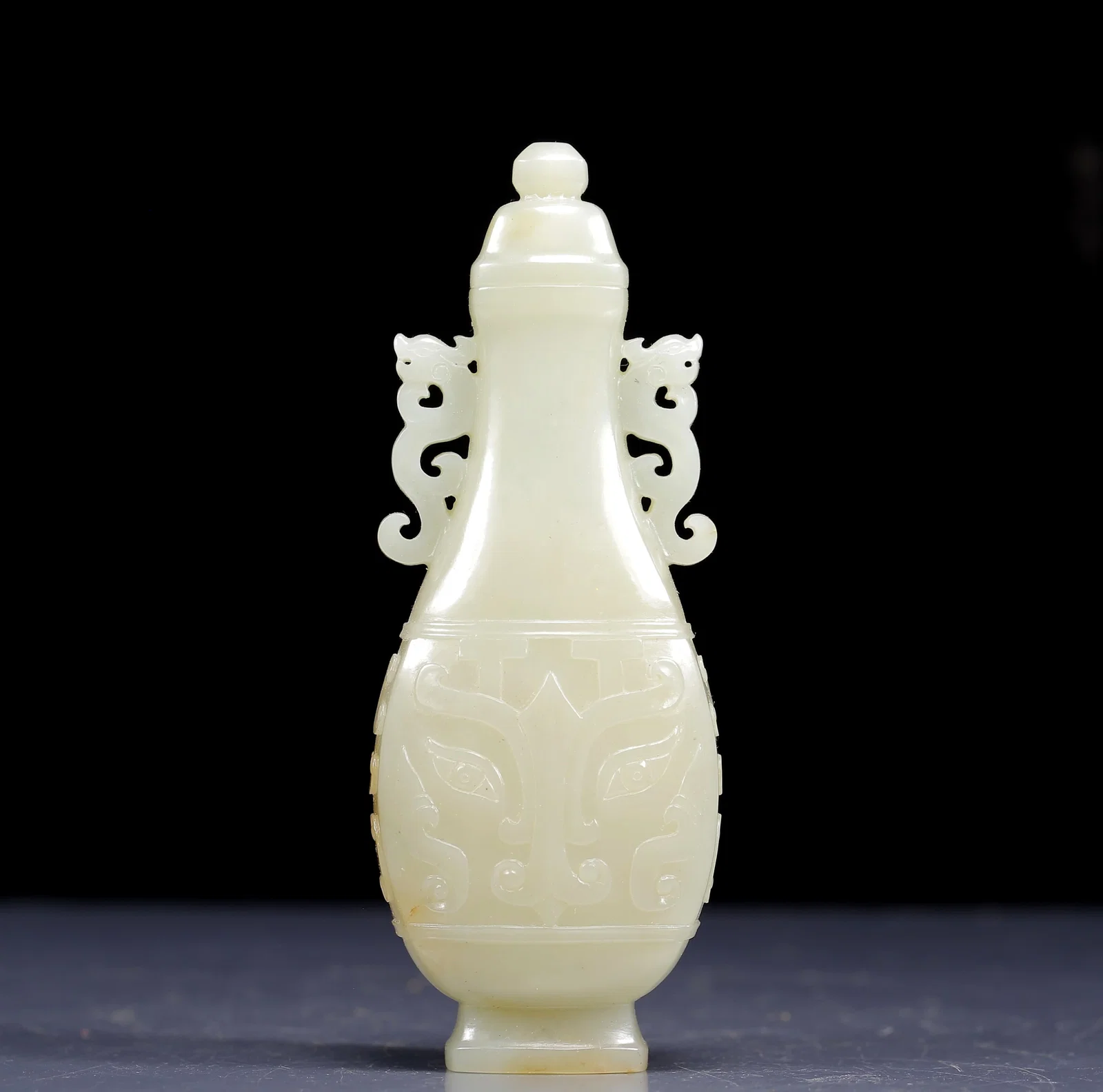 An Exquisite White Jade Beast-Face Pattern Double-Ears Bottle
