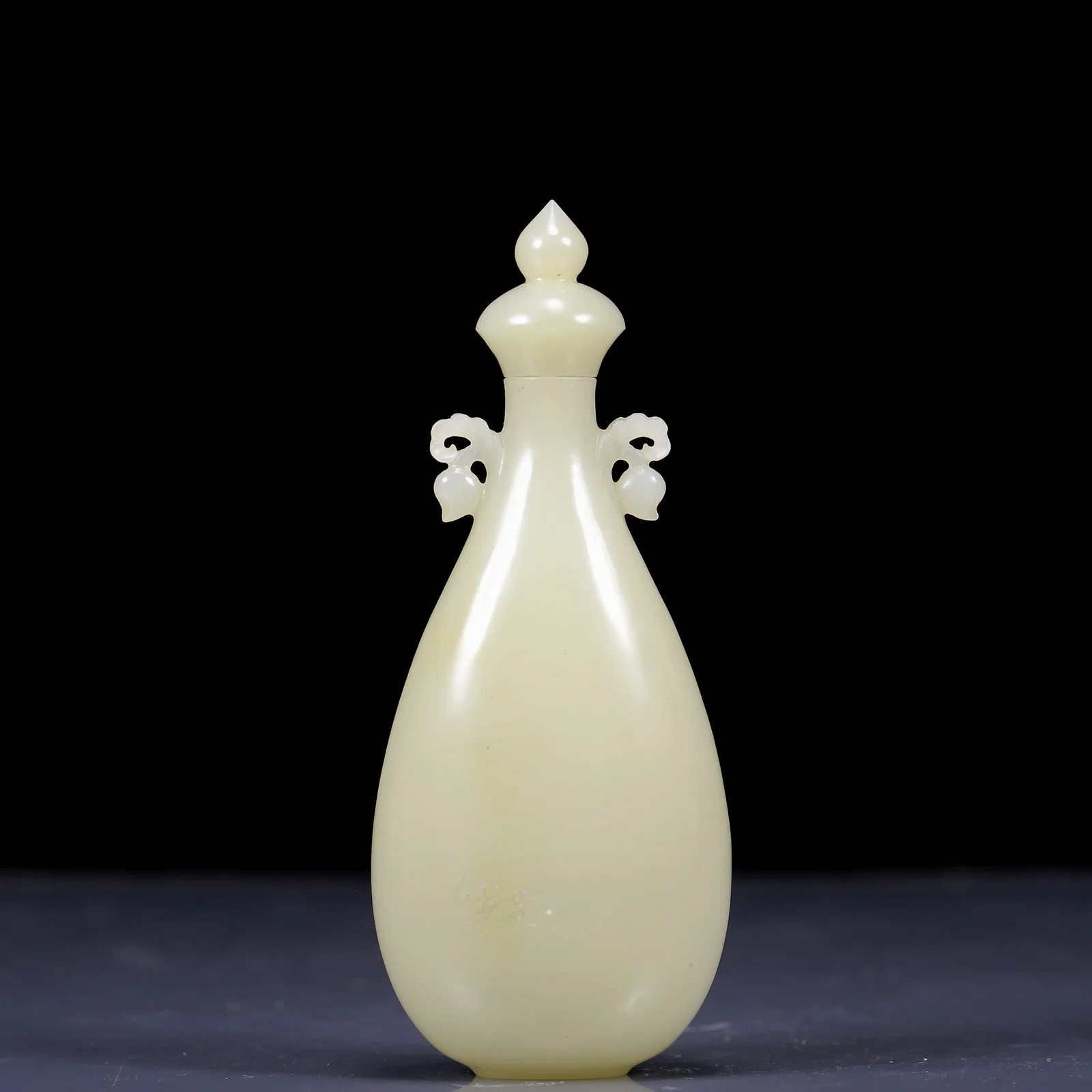 An Exquisite White Jade Double-Ears Bottle