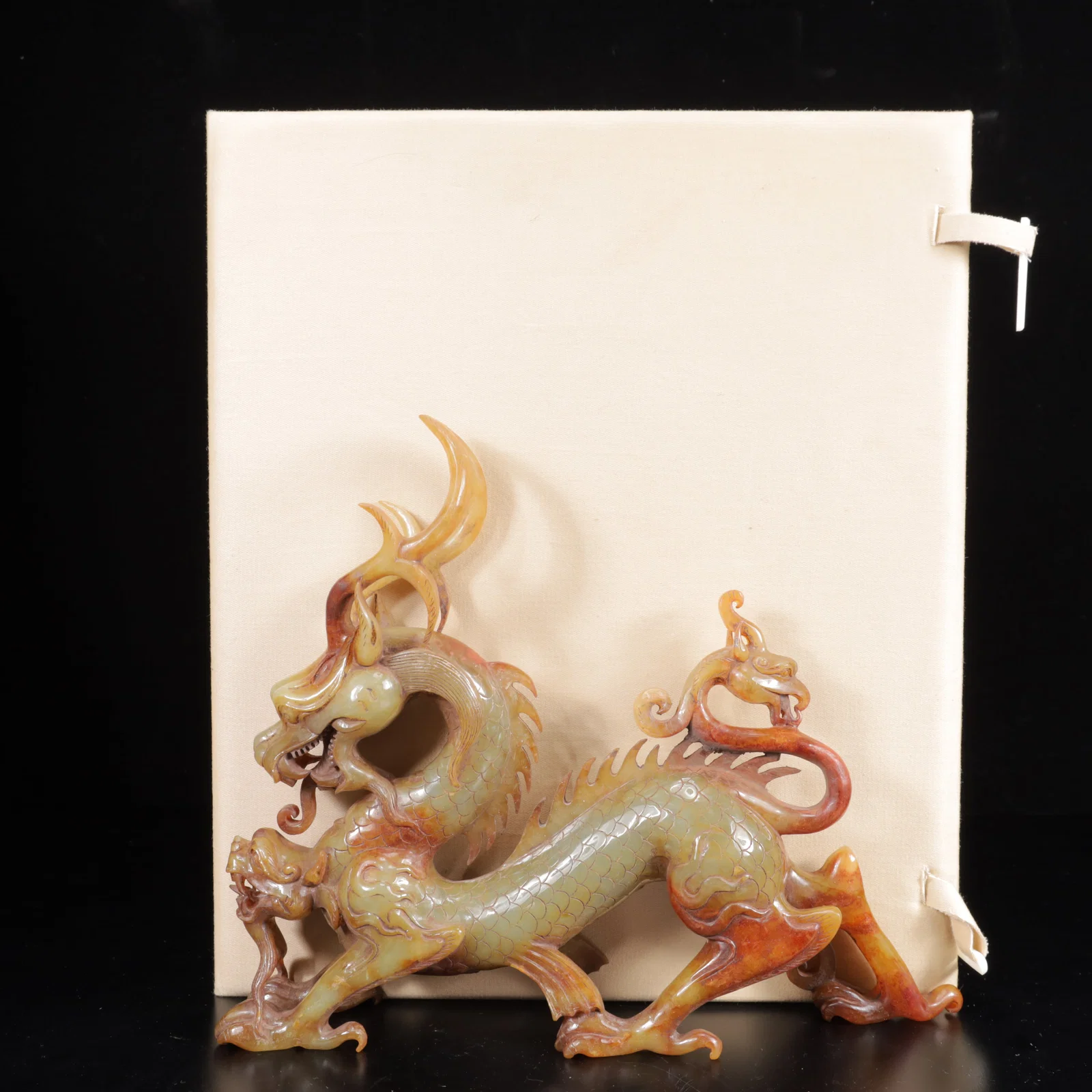 An Exquisite White Jade Dragon and Phoenix Ornament
