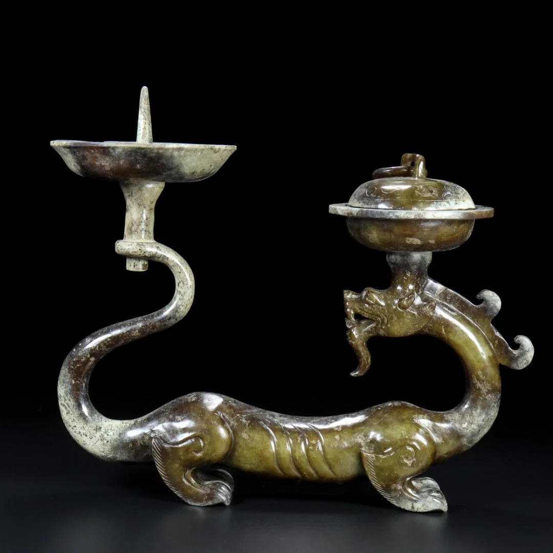 An Exquisite White Jade Dragon-Shaped Candlestick