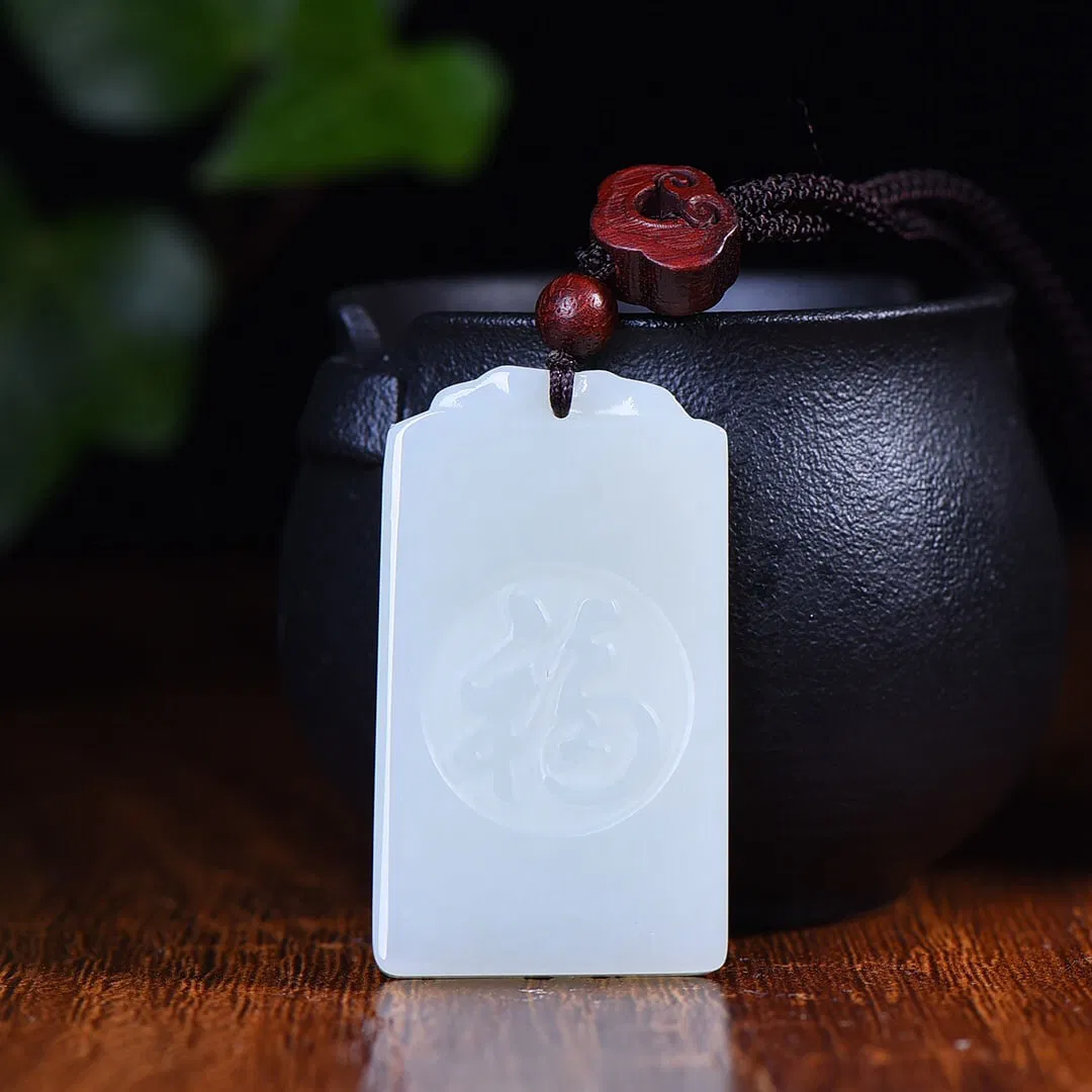An Exquisite White Jade Fu-Character Pattern Pendant