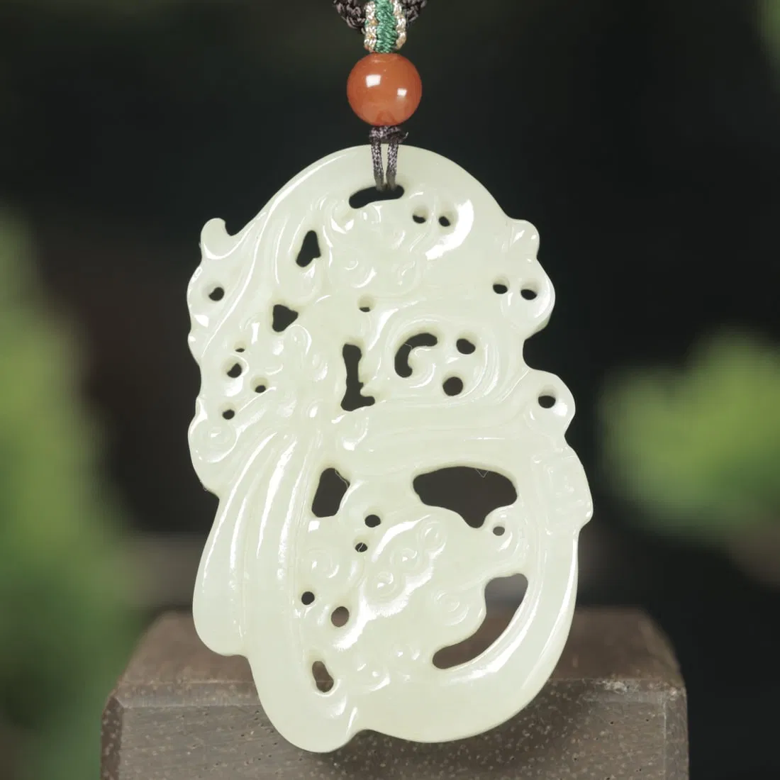 An Exquisite White Jade Fu-Character Pendant