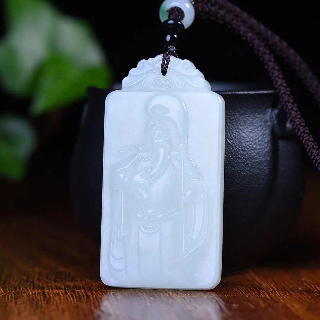 An Exquisite White Jade Guangong Pattern Pendant