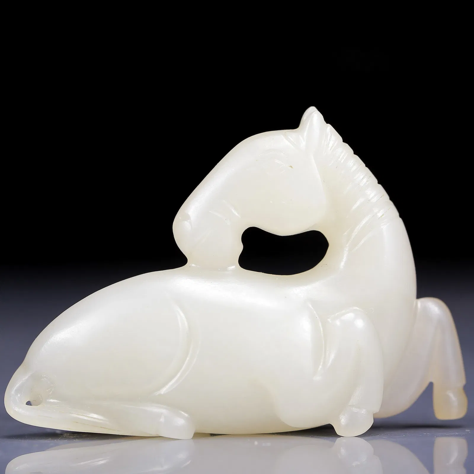 An Exquisite White Jade Horse Pendant