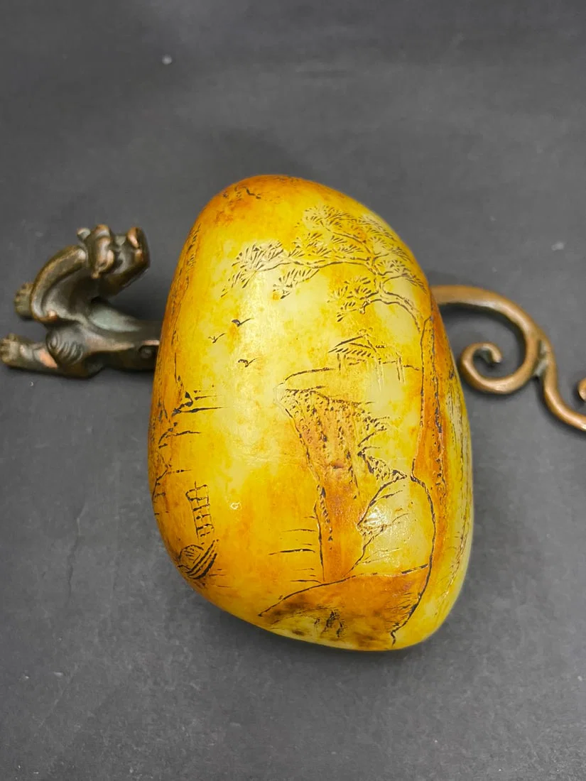 An Exquisite White Jade Landscape and Figure Pattern Hand Piece