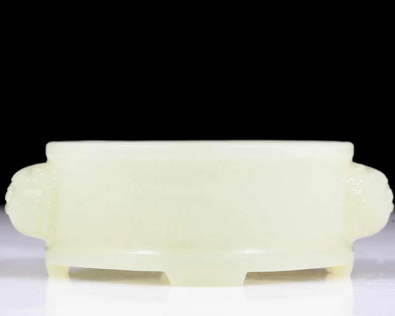 An exquisite white jade lion ear incense burner