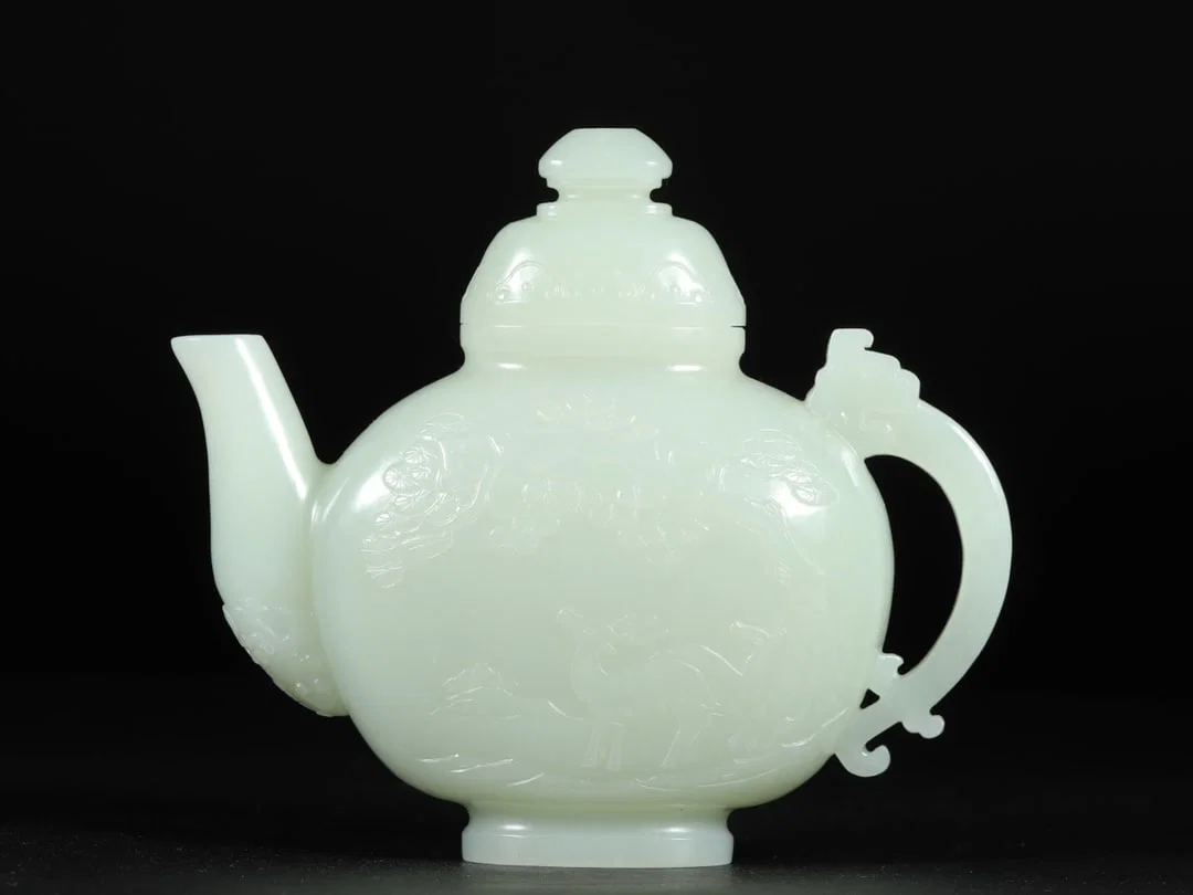 An Exquisite White Jade Pine and Crane Pattern Ewer