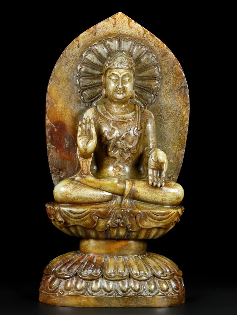 An Exquisite White Jade Statue of Sakyamuni
