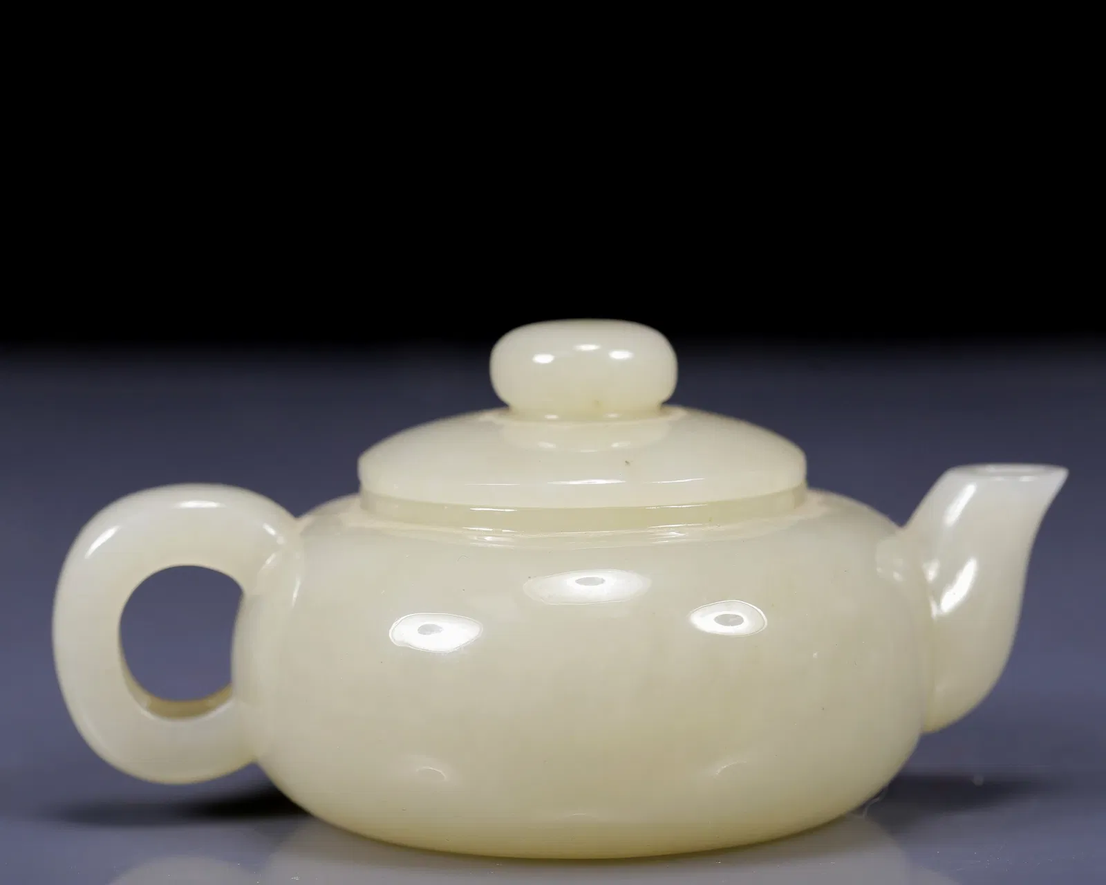 An Exquisite White Jade Teapot