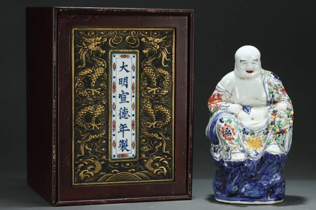 An Exquisite Wucai Lotus and Dragon Pattern Statue of Arhat