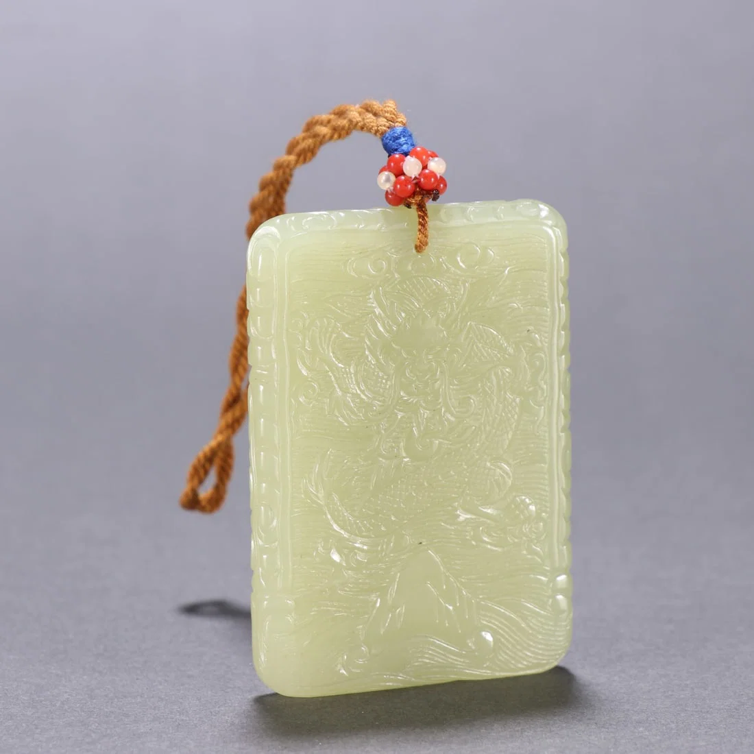 An Exquisite Yellow Jade Dragon Pattern Pendant