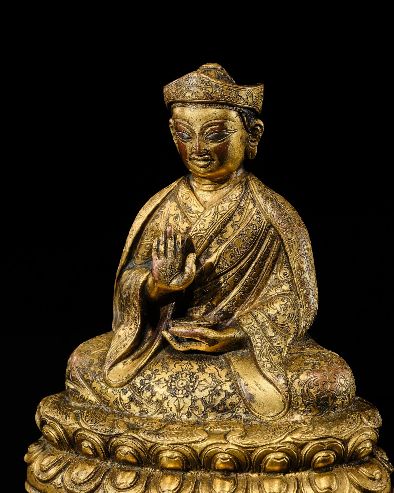 AN EXTREMELY RARE, INSCRIBED, PARCEL-SILVERED, AND GILT COPPER ALLOY PORTRAIT FIGURE OF THE THIRD