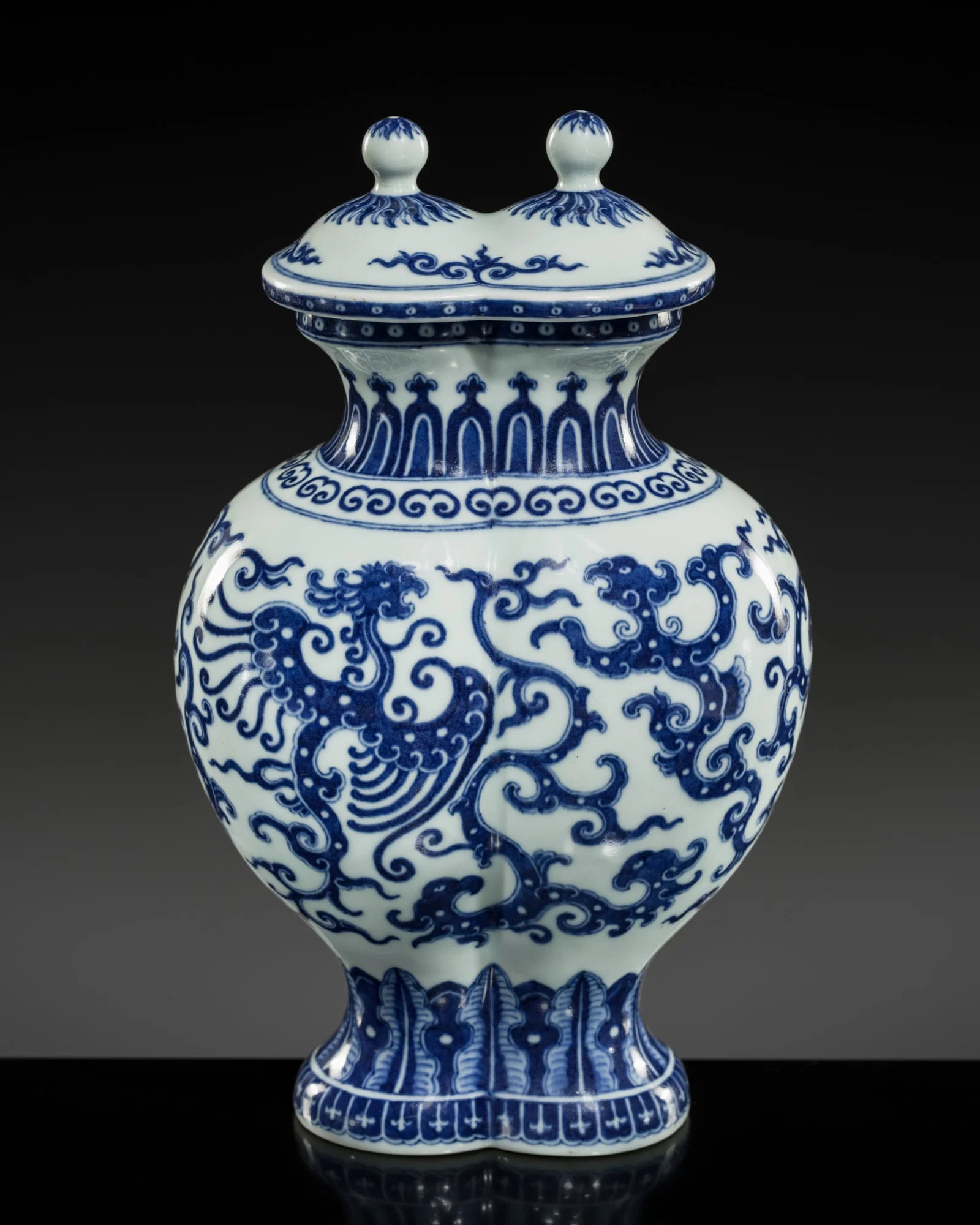 AN IMPERIAL BLUE AND WHITE 'PHOENIX AND DRAGON' DOUBLE VASE AND COVER, QIANLONG MARK AND OF THE