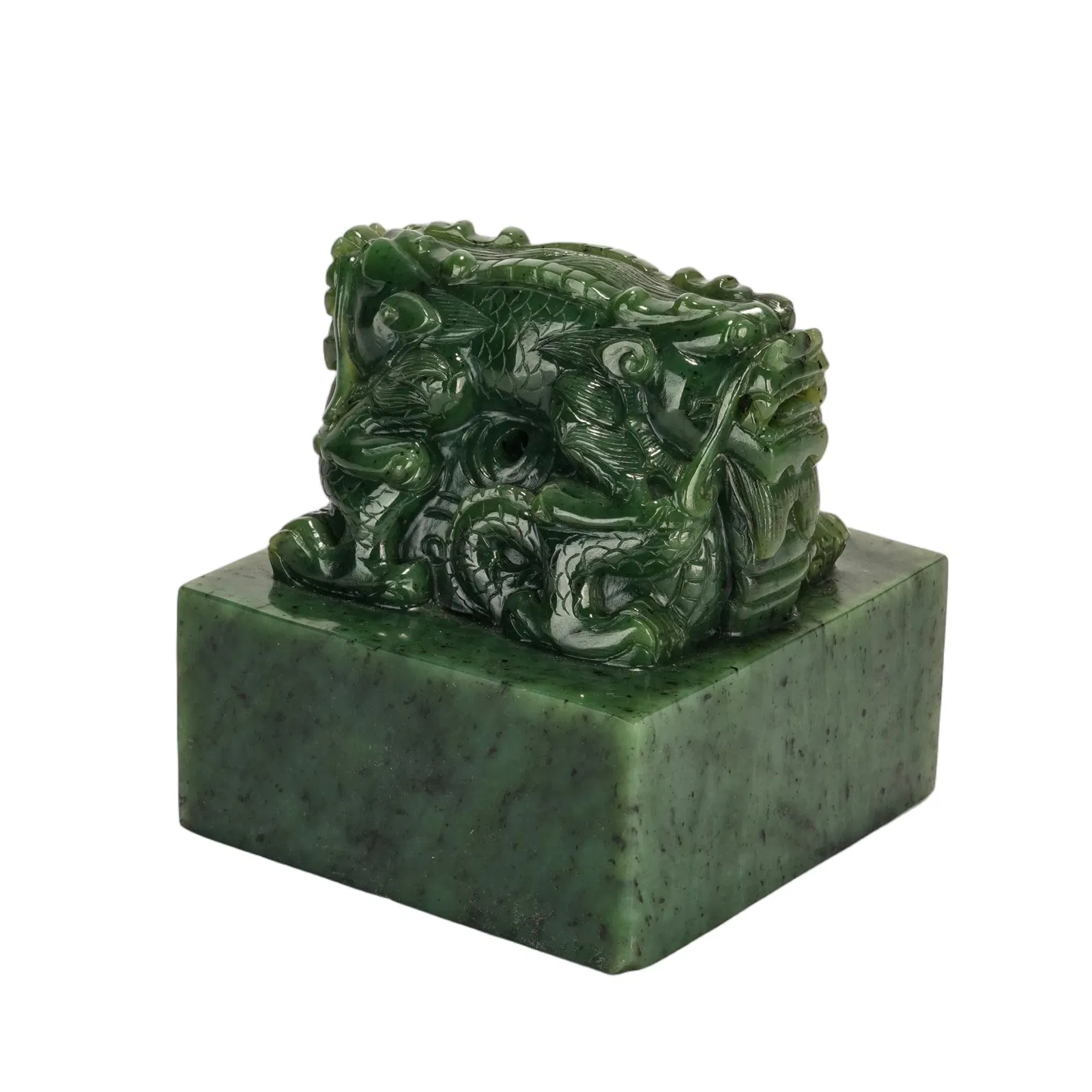 AN IMPERIAL CARVED SPINACH GREEN JADE DRAGON SEAL