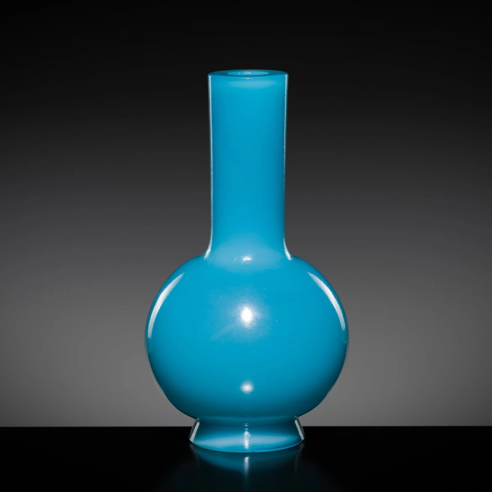 AN IMPERIAL TURQUOISE-BLUE GLASS BOTTLE VASE, QIANLONG MARK AND PERIOD
