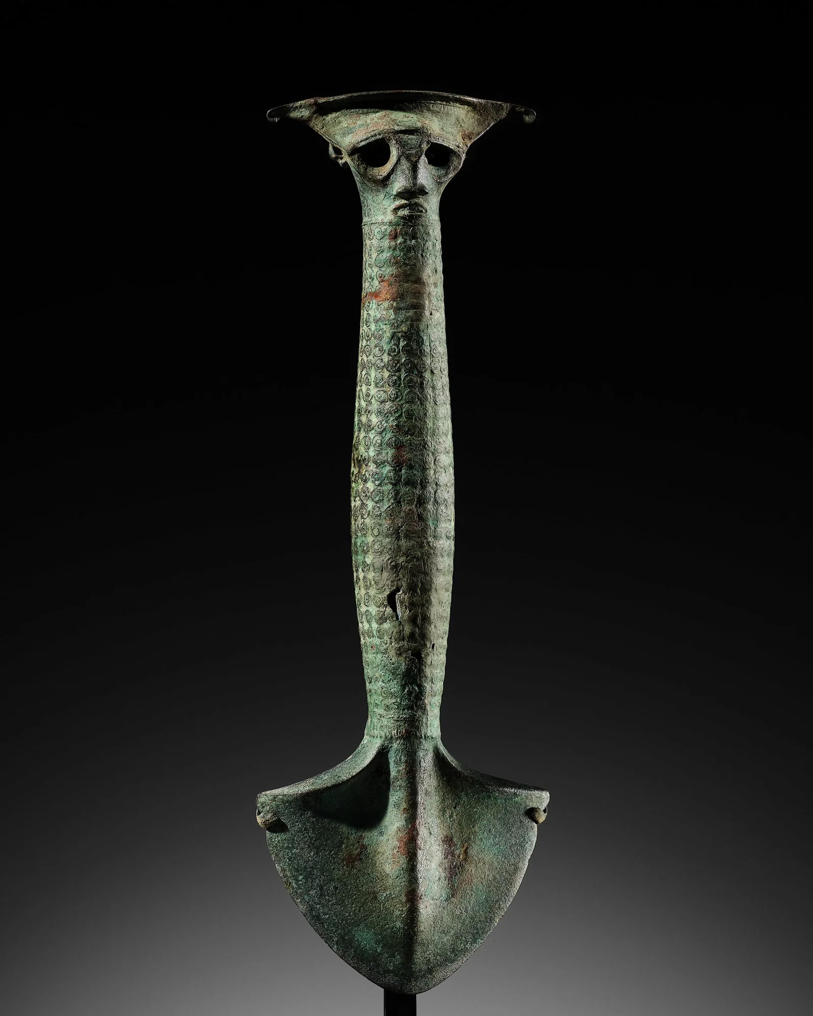 AN IMPORTANT AND LARGE BRONZE RITUAL AXE, INDONESIA, NORTH SUMATRA, CIRCA 500 BC-300 AD