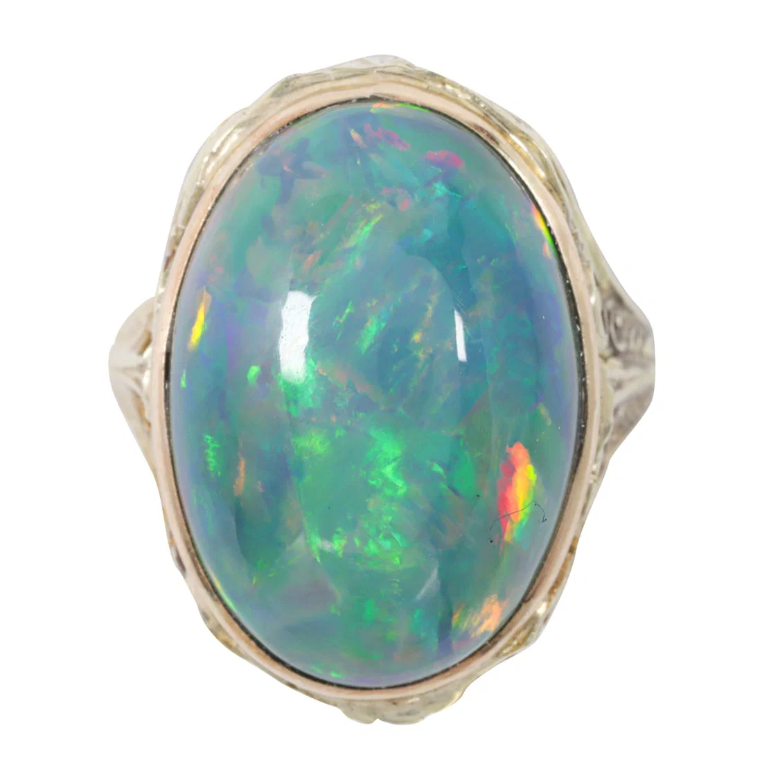 An opal and 14k gold ring