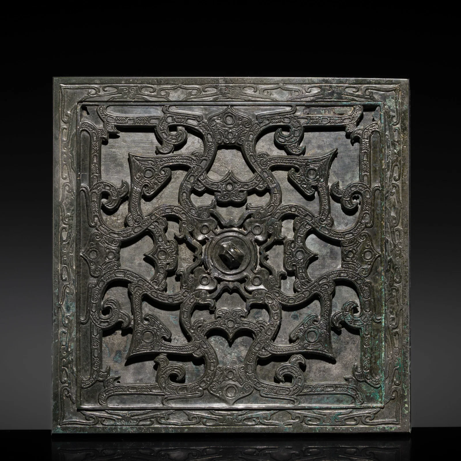 AN OPENWORK DOUBLE-TIER BRONZE MIRROR, JIACENG JING, WARRING STATES PERIOD