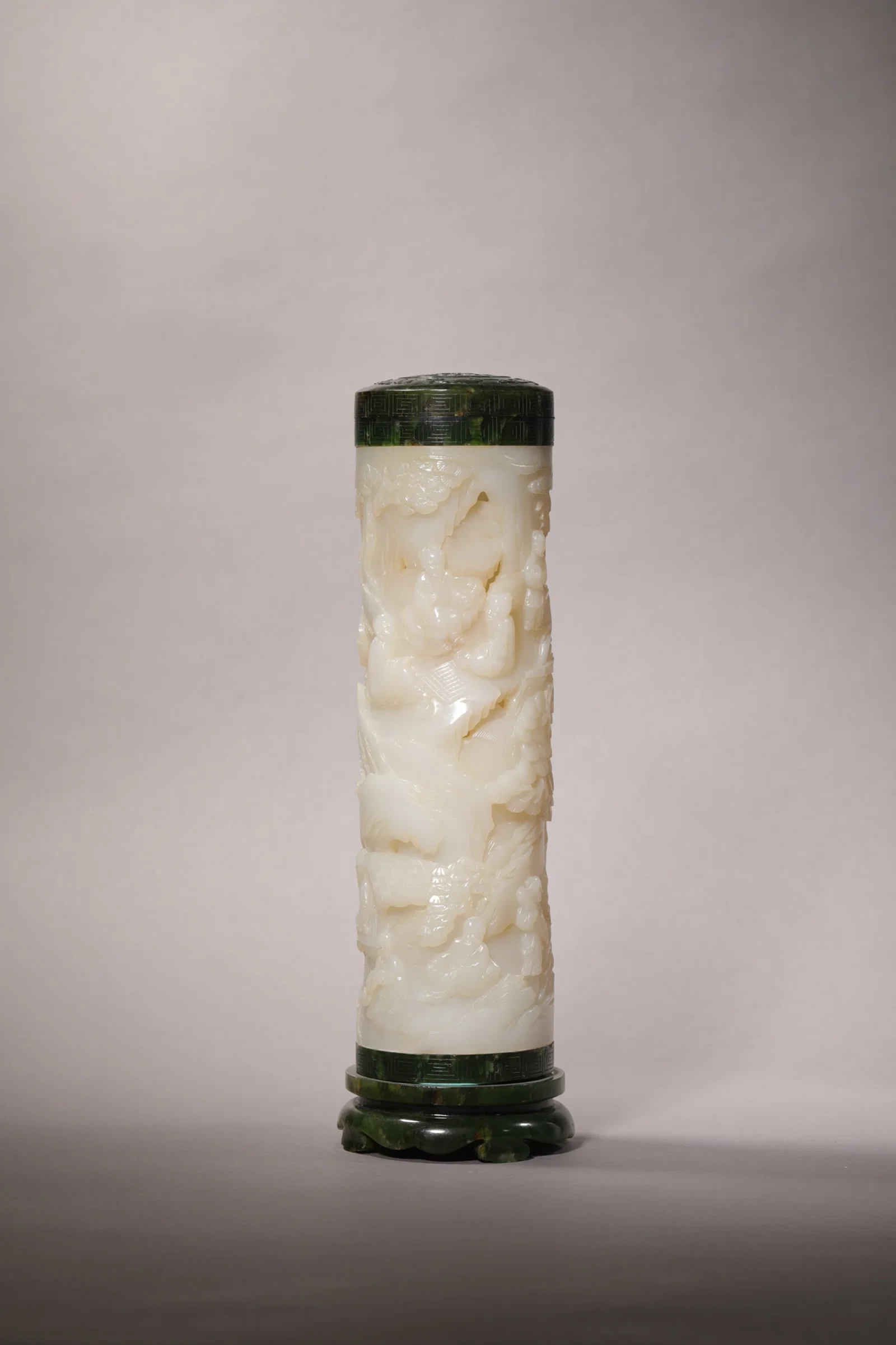 AN OPENWORK WHITE AND SPINACH-GREEN JADE 'FIGURE' INCENSE TUBE