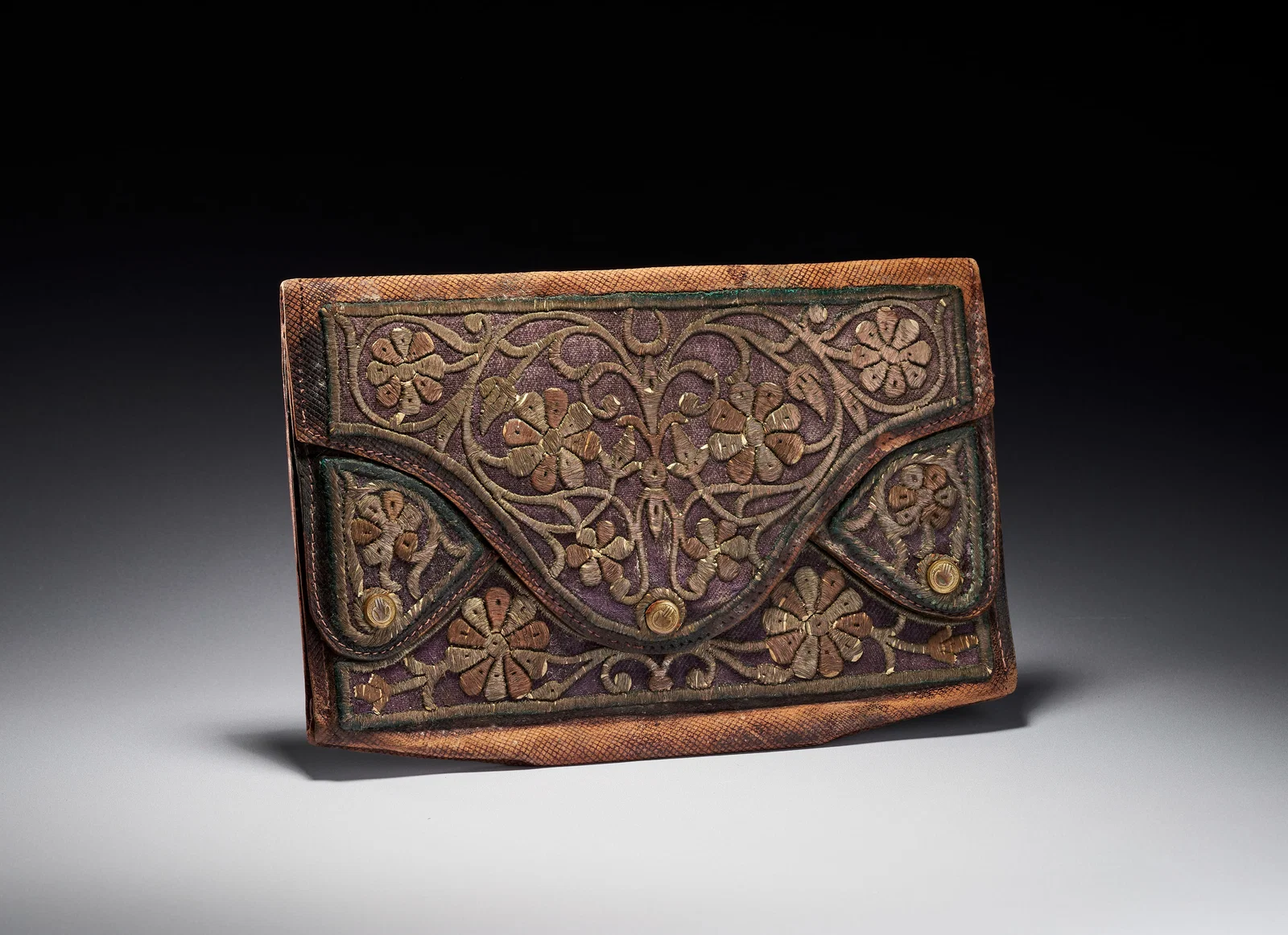 AN OTTOMAN GILT-THREAD EMBROIDERED LEATHER WALLET, TURKEY, 18TH CENTURY